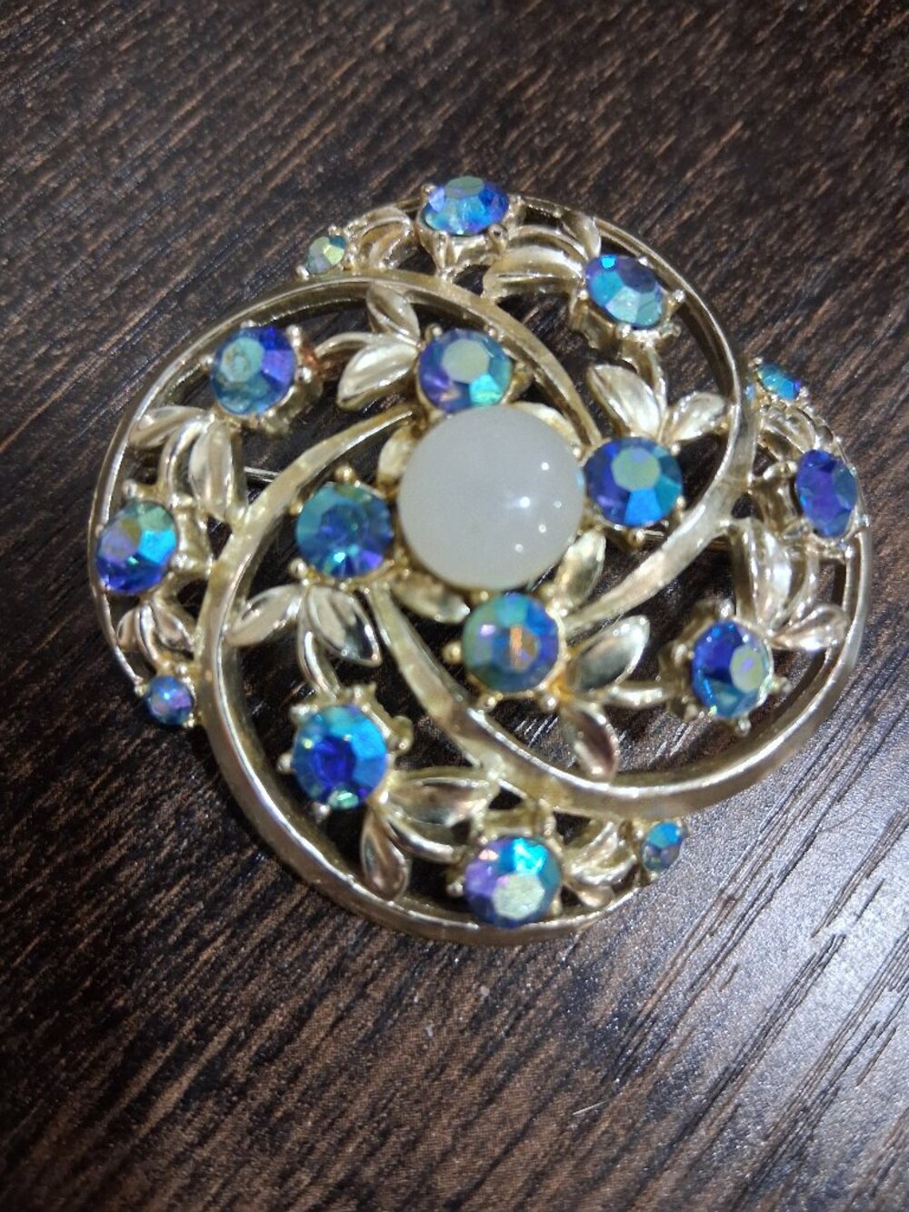 1950's Vintage Star brooch pin with blue aurora borealis stones